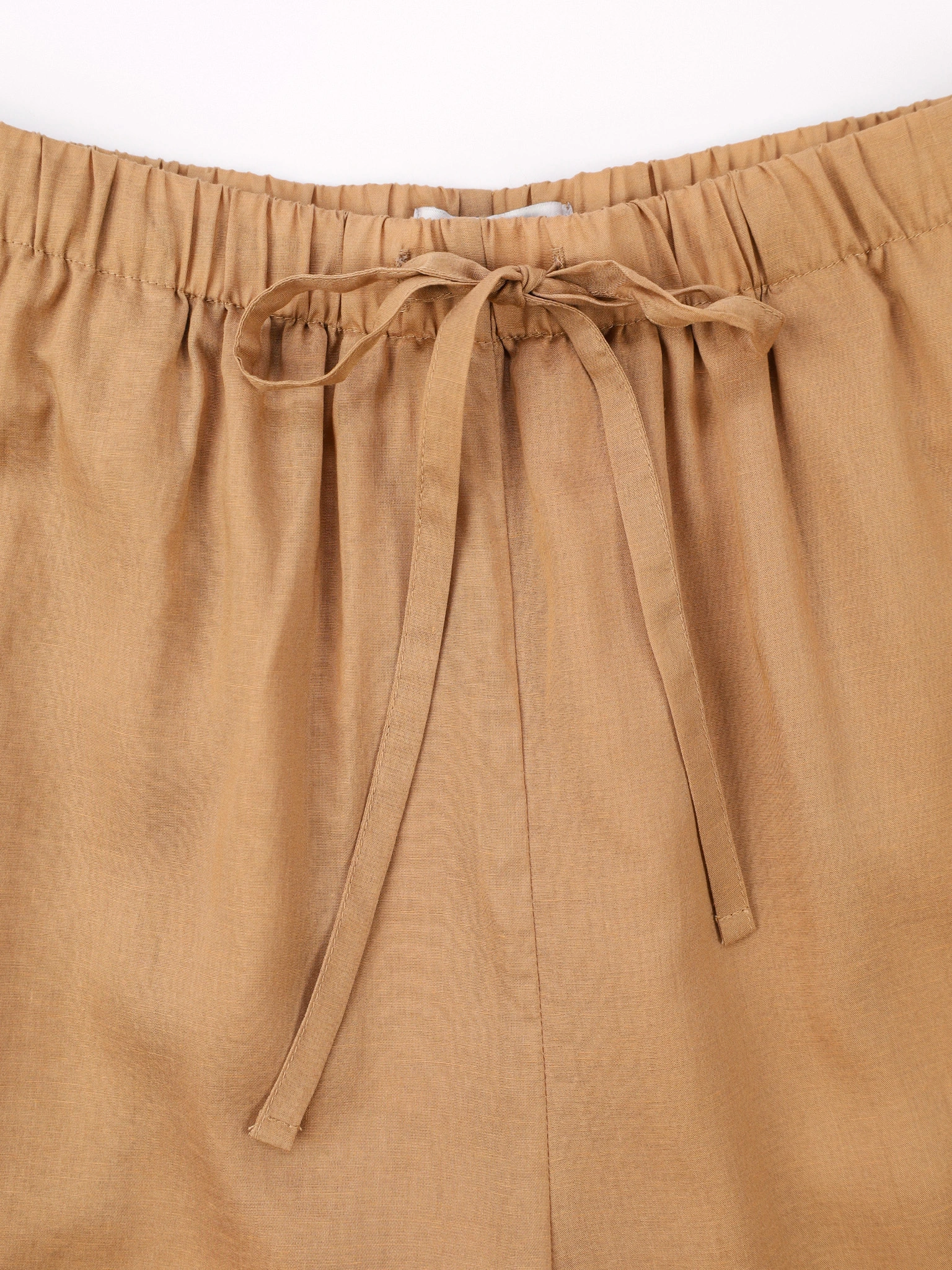 Брюки светло-коричневого цвета свободного кроя